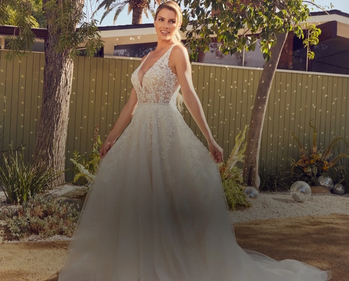 Brides in Beloved by Casablanca Bridal Gowns